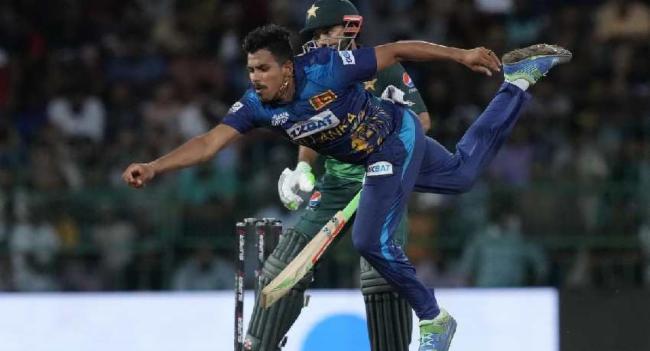 Theekshana strains hamstring while fielding